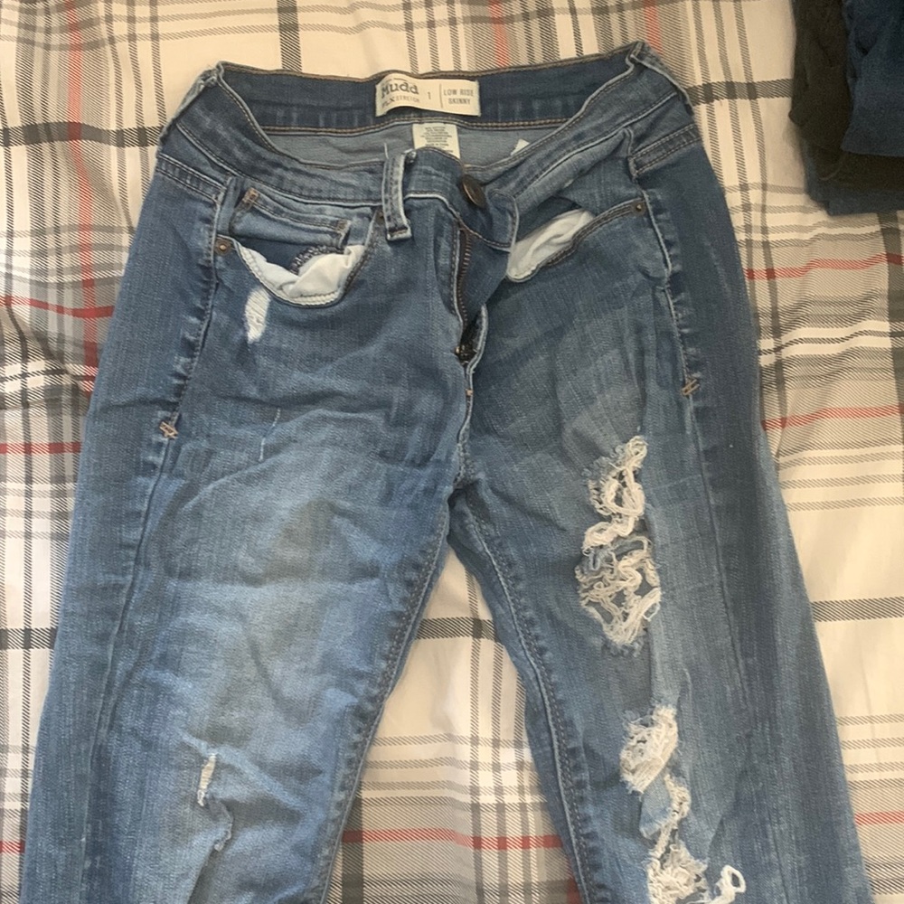 Low rise skinny distressed denim jeans